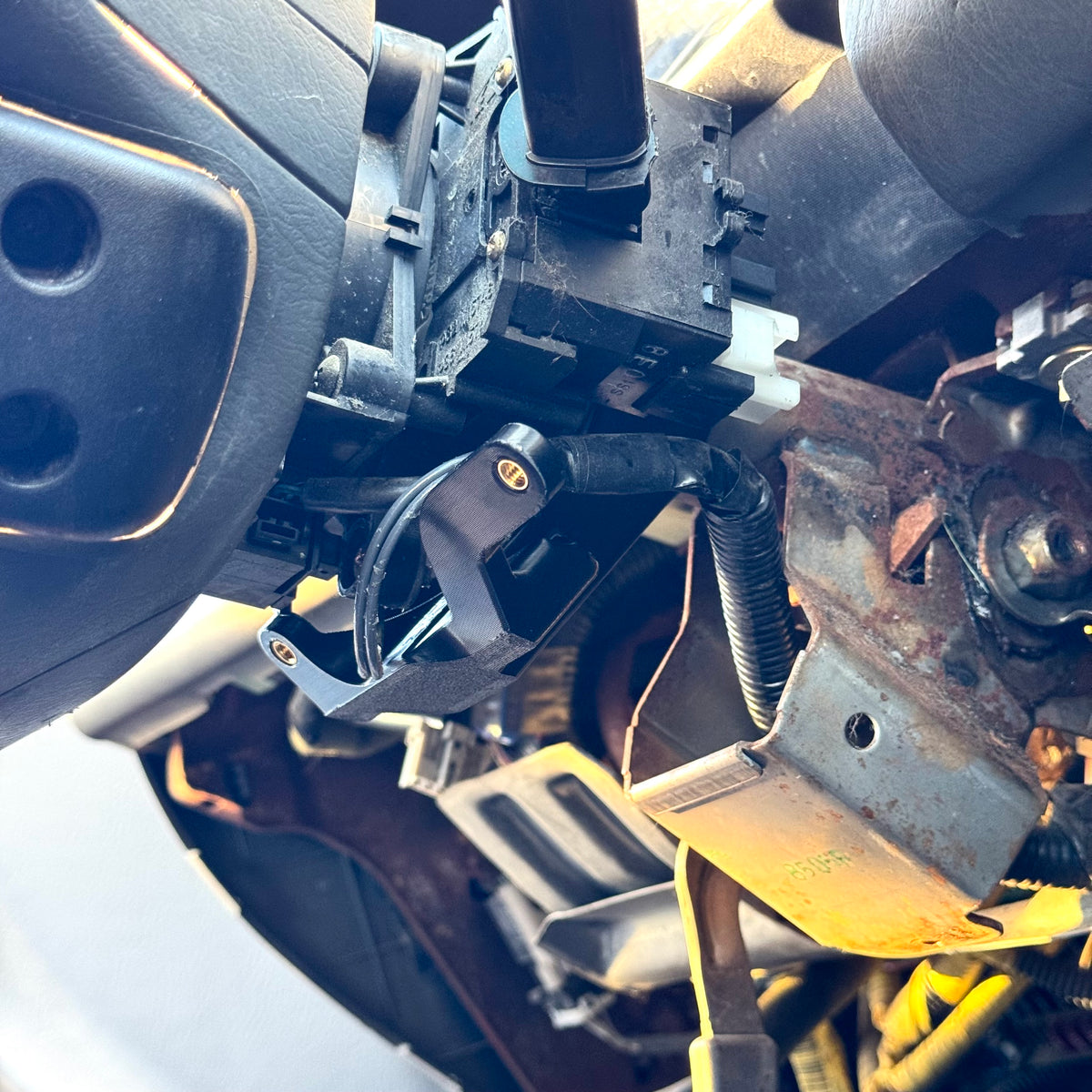 Mount for Ignition Steering Column Cover